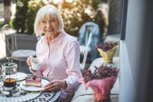 Senior Woman Outdoor City Cafe